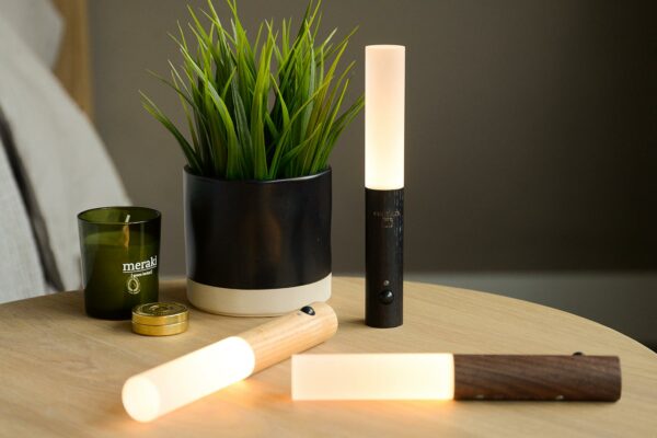 baton LED lights with wooden bases in black, ash or walnut