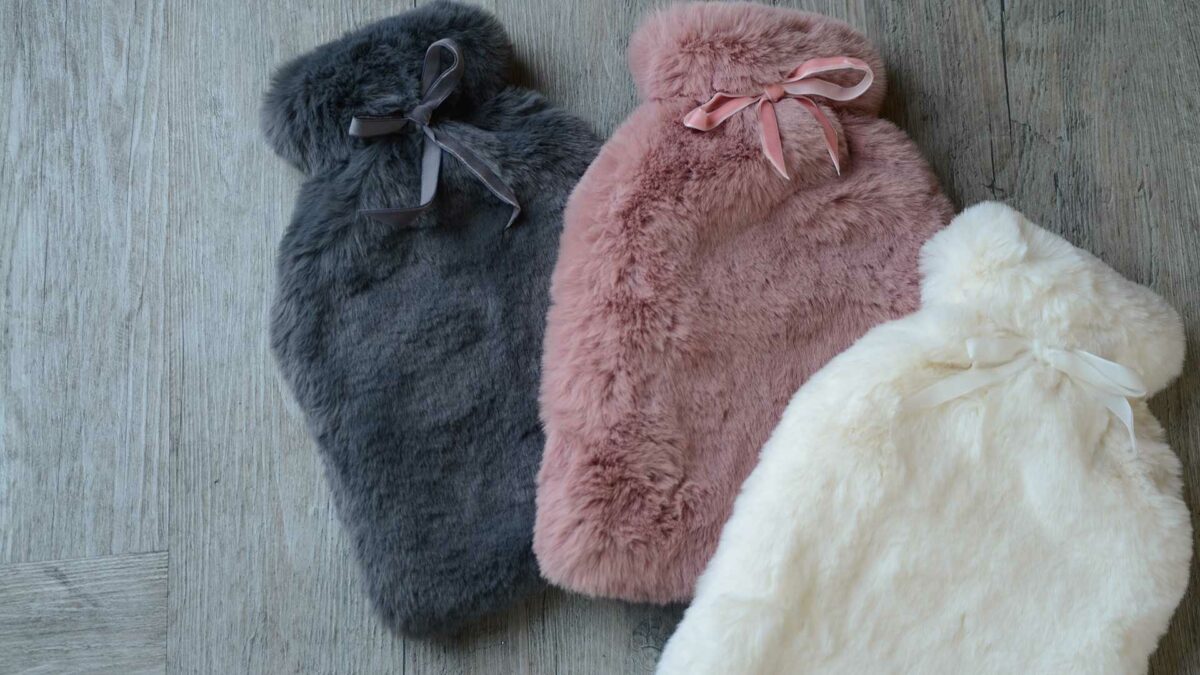 luxuriously soft faux fur covered hot water bottles in 3 colours