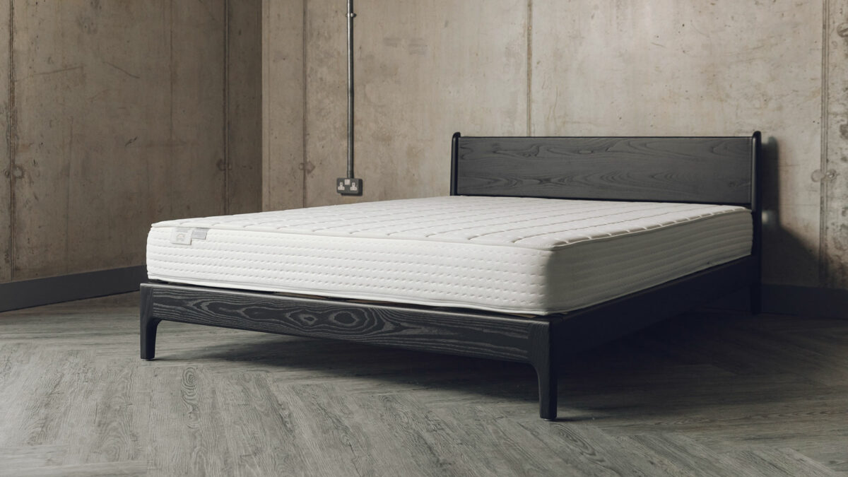 The Pimlico low bed here is made from black stained solid Ash wood and is shown without bedding