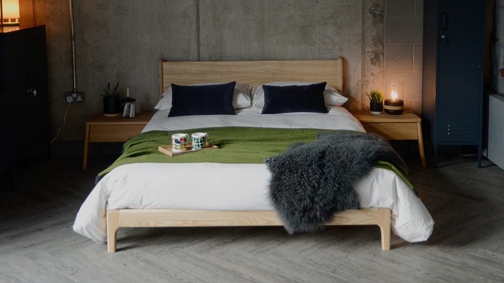 Scandinavian bedroom look featuring our low wooden Carnaby bed in Ash