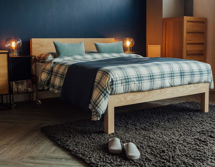 Ash Tibet bed with brushed cotton navy plaid bedding