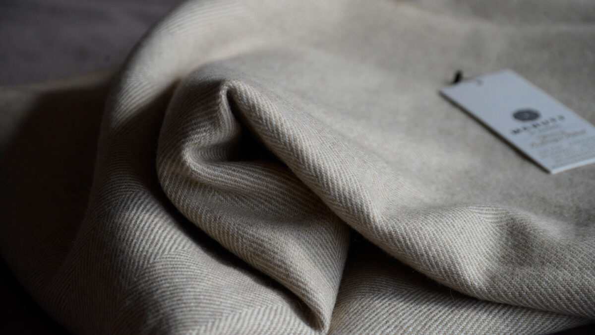 Beige Herringbone Throw McNutt Fabric Fold Detail