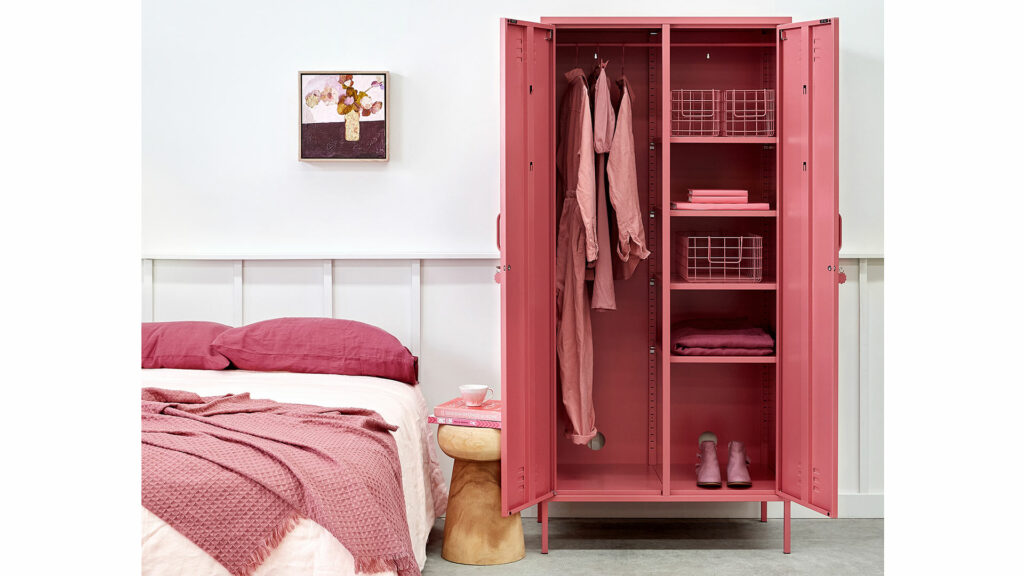 wardrobe storage locker in berry pink shown with both doors open