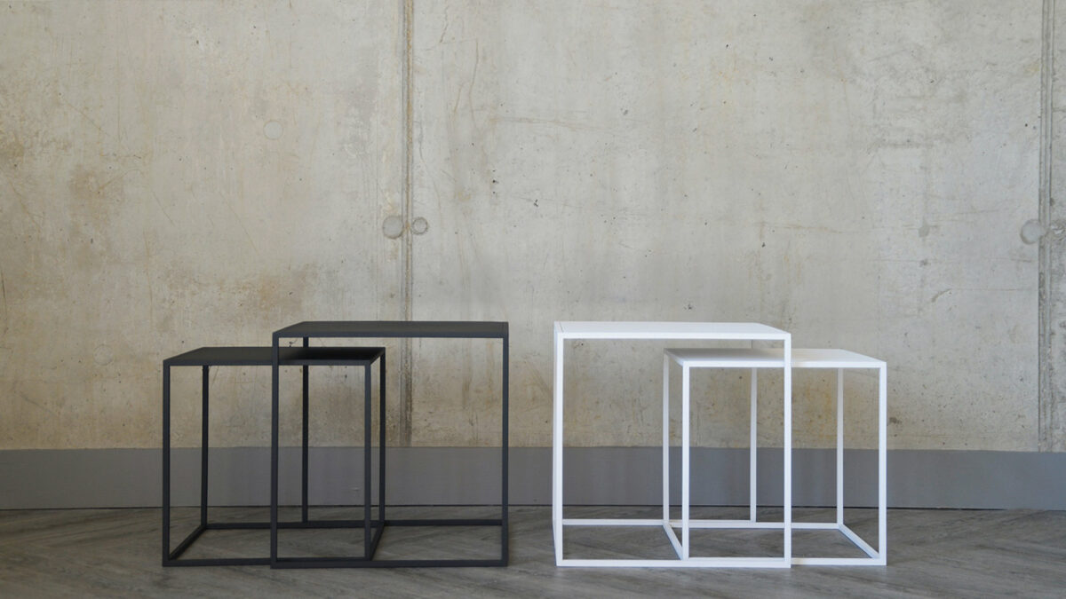 powder-coated steel nesting tables in slate grey and white