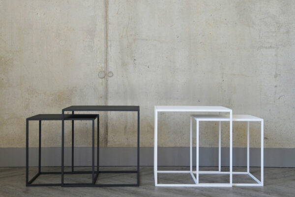 powder-coated steel nesting tables in slate grey and white