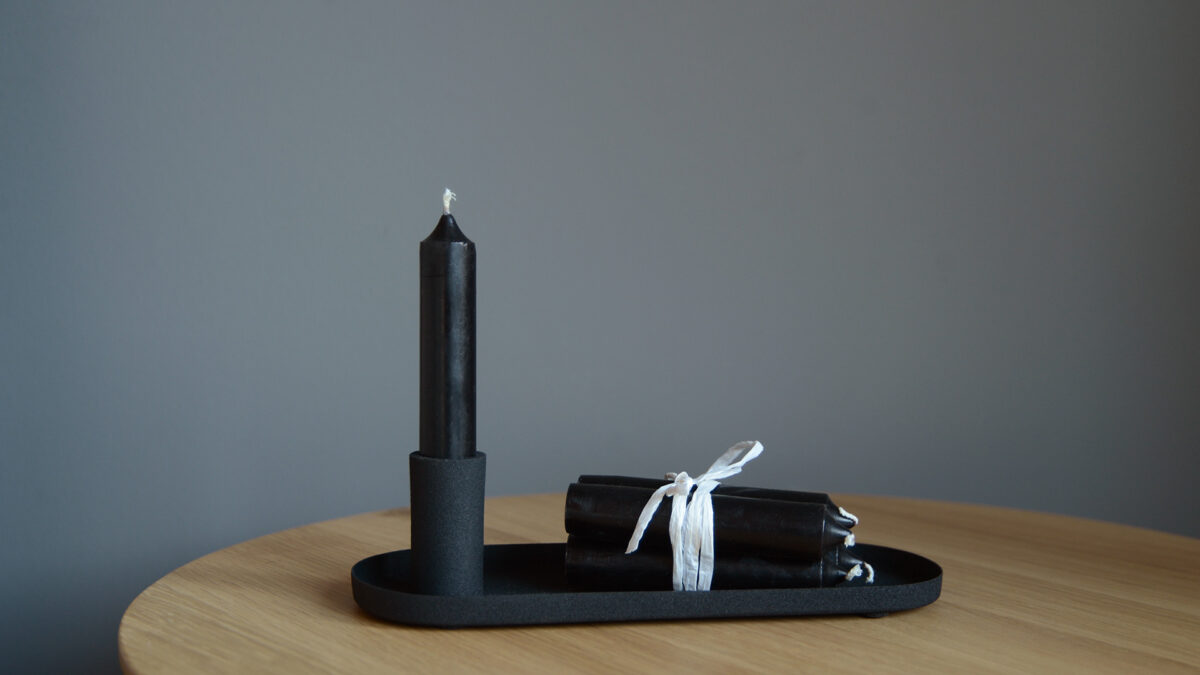 textured black metal candle holder with tray