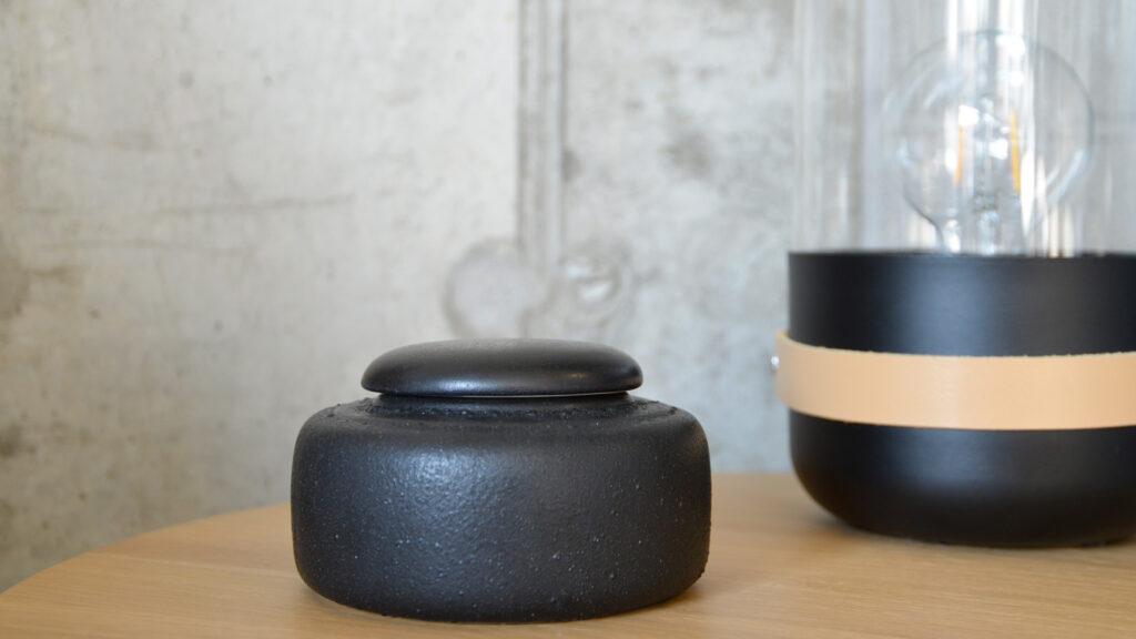 low black ceramic jar with lid