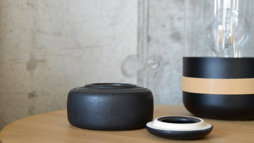 low black ceramic jar with lid