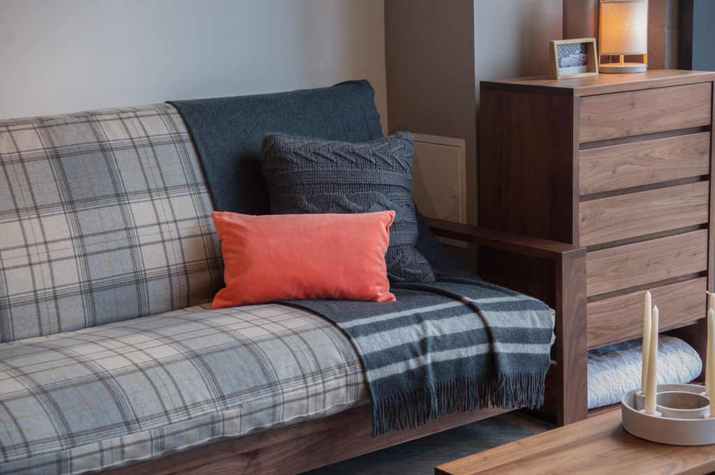 Black Lotus cuba futon sofa-bed, close up photo showing removable wool cover