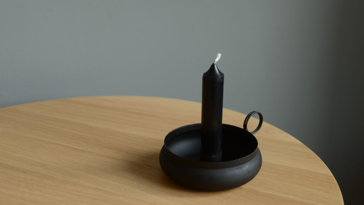 Black metal old fashioned candle holder