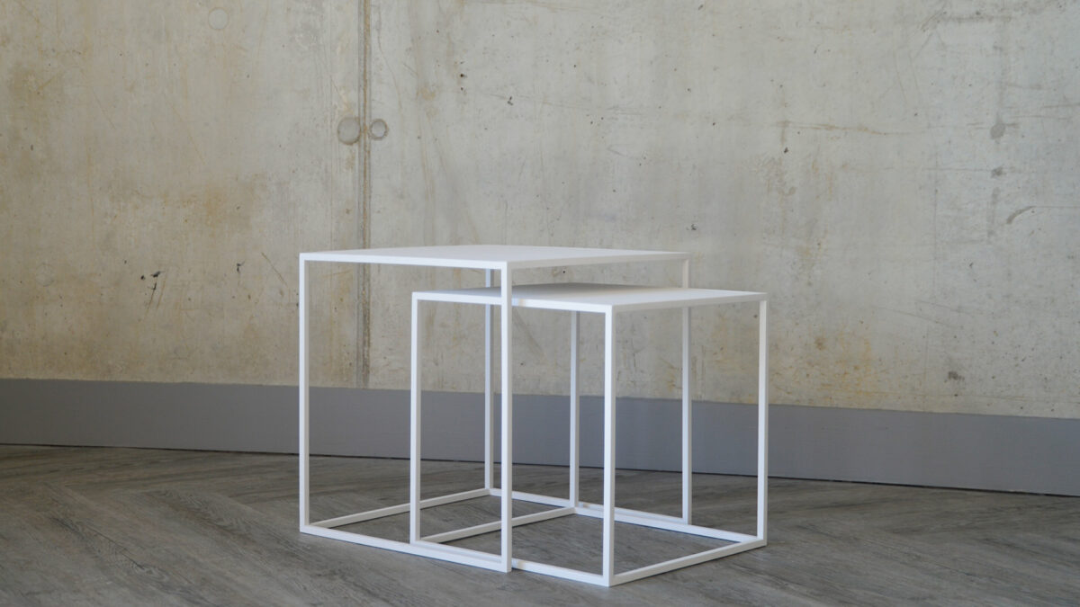 nesting set of tables in white powder coated steel