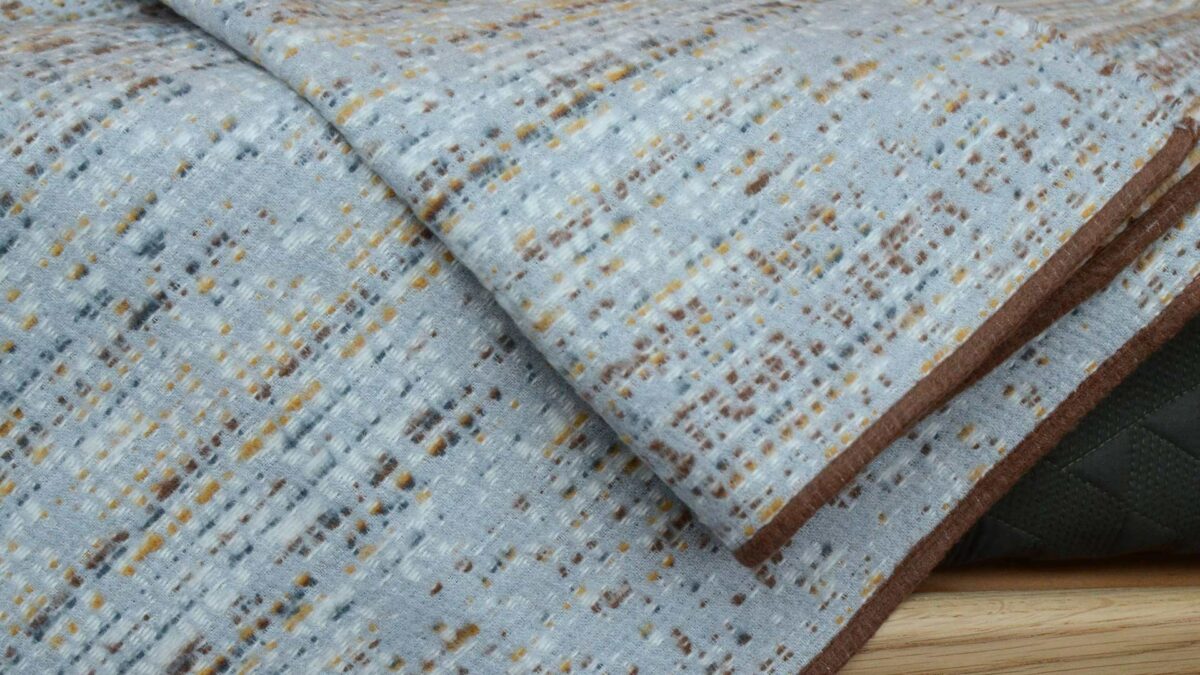 Boucle soft cotton rich throws edge detail
