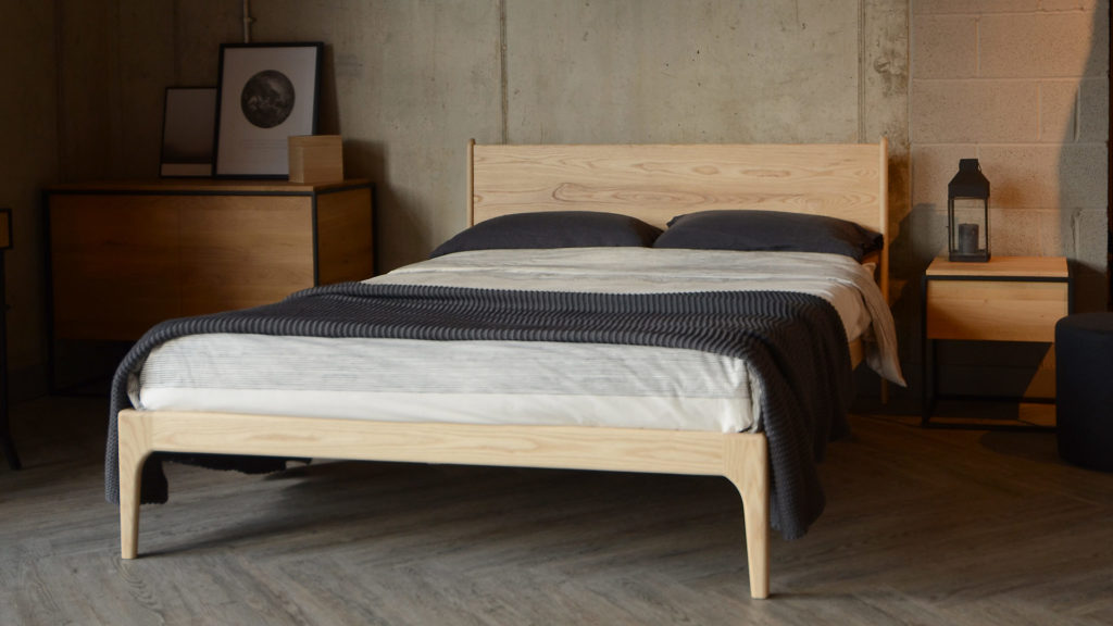 Contemporary solid wood Camden bed here in pale Ash wood