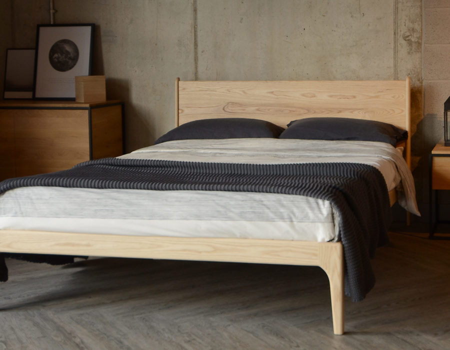 Contemporary solid wood Camden bed here in pale Ash wood