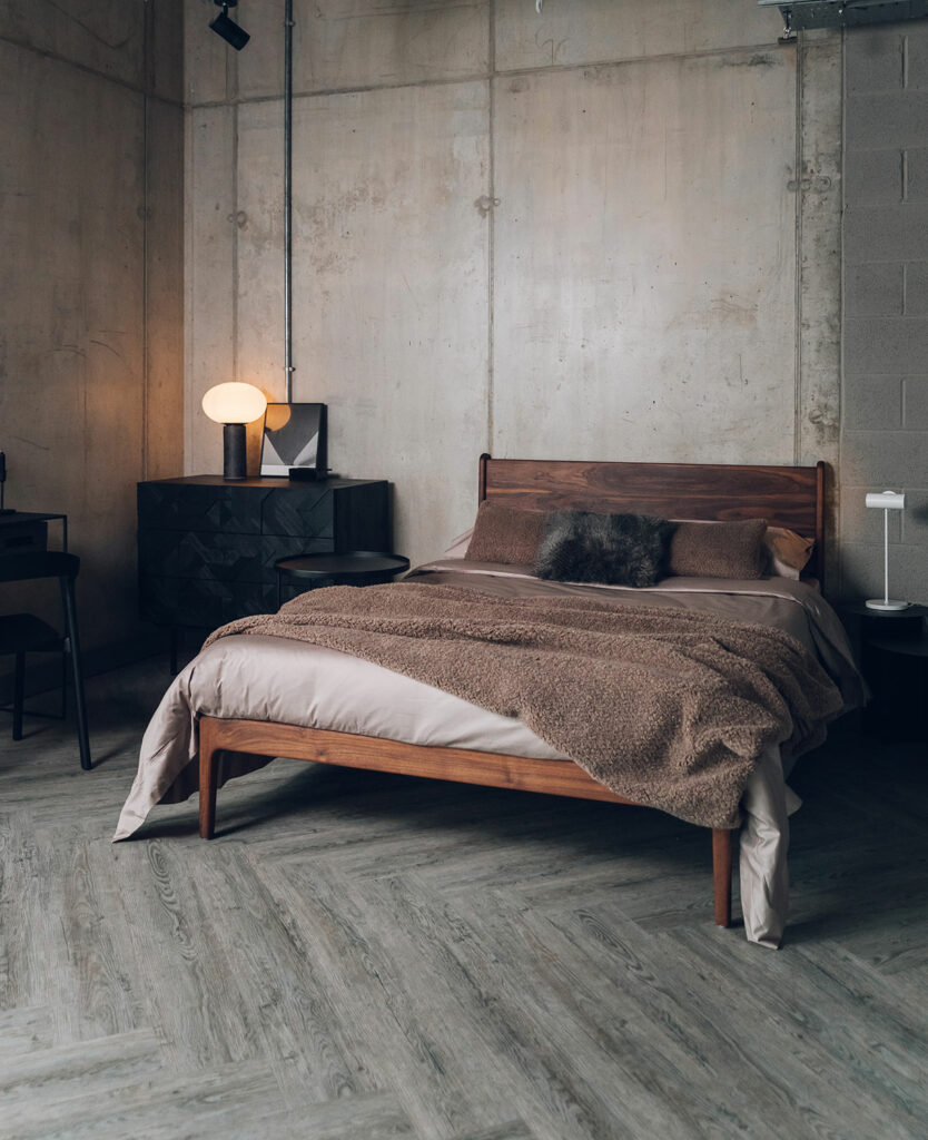 solid walnut camden with with pure cotton bedding and brown teddy bear throw with ethnicraft black graphic dresser.