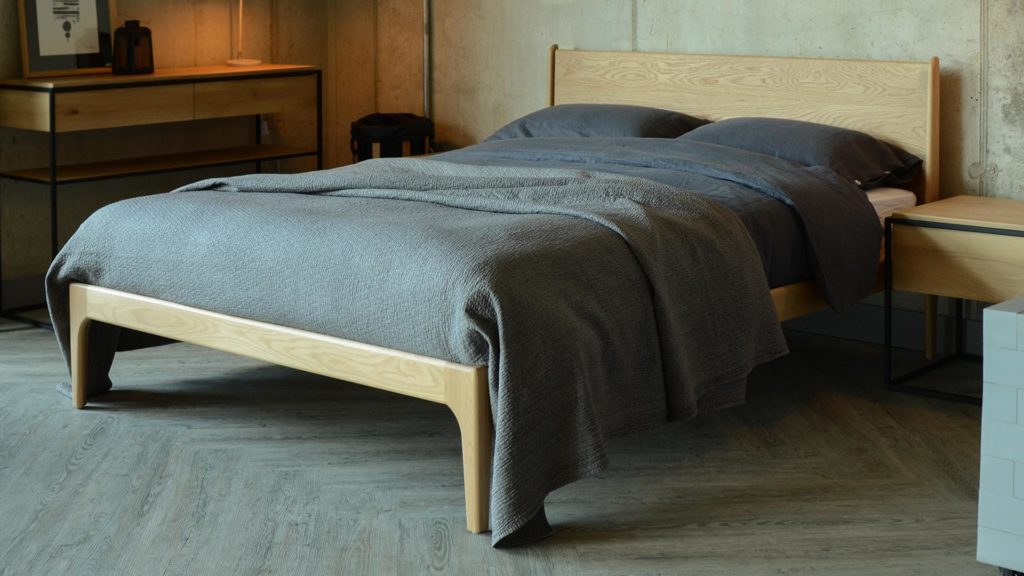 The Camden a mid-century style, taller wooden bed in Oak