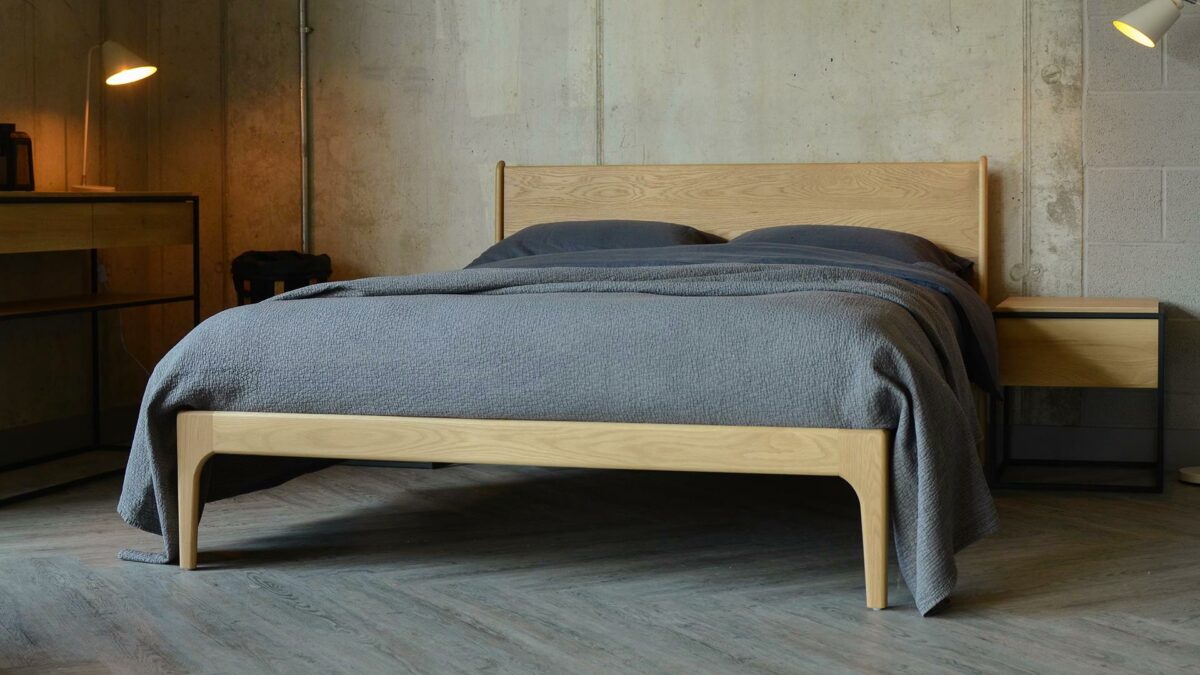 Camden handmade bed front 3Q with grey bedding 1