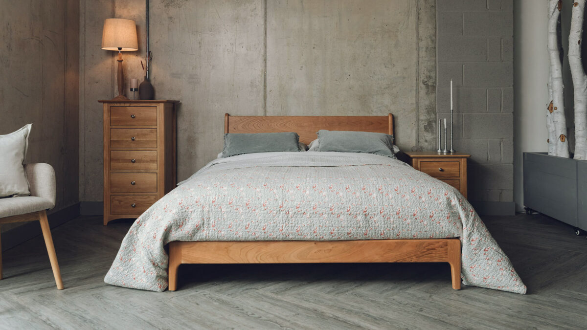 Low hand crafted Carnaby bed made in solid Cherry wood