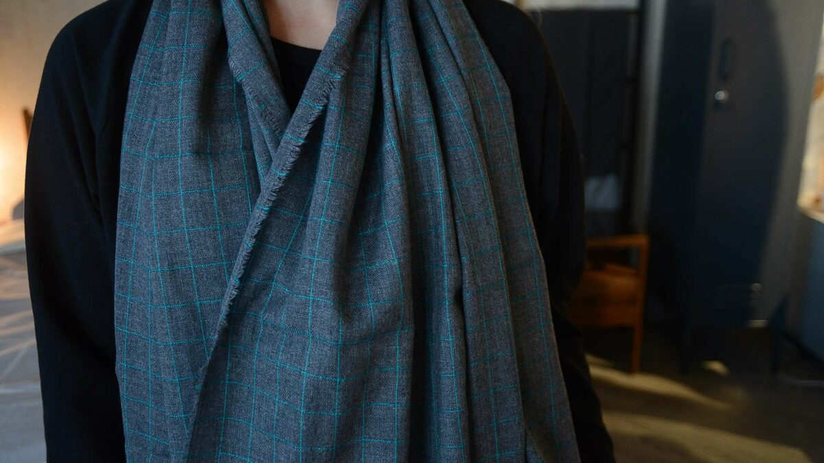 Charcoal and teal cashmere check scarf close up