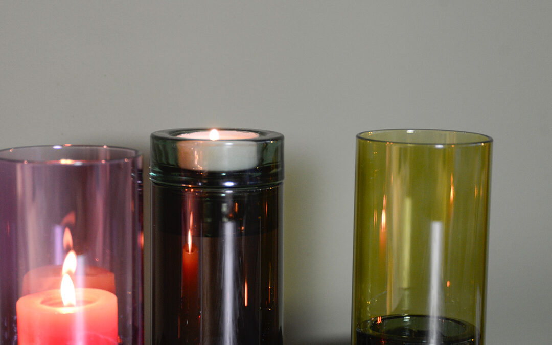 glass candle holders in mixed colours for tapers or candles