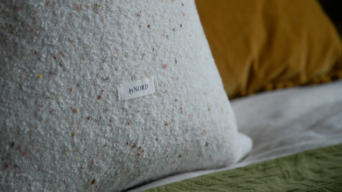 Cosy Flecked Cushion Cover Tag Closeup