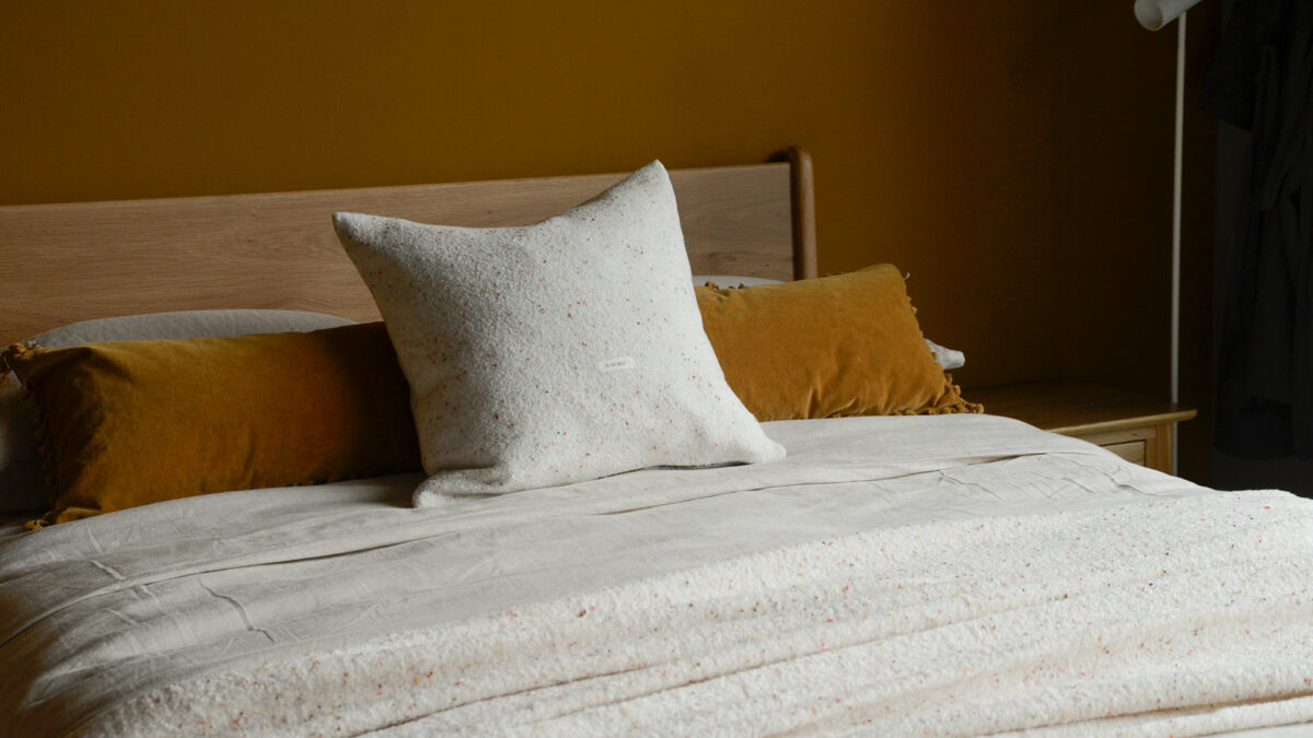 Cosy Flecked Cushion Cover on Oak Hoxton