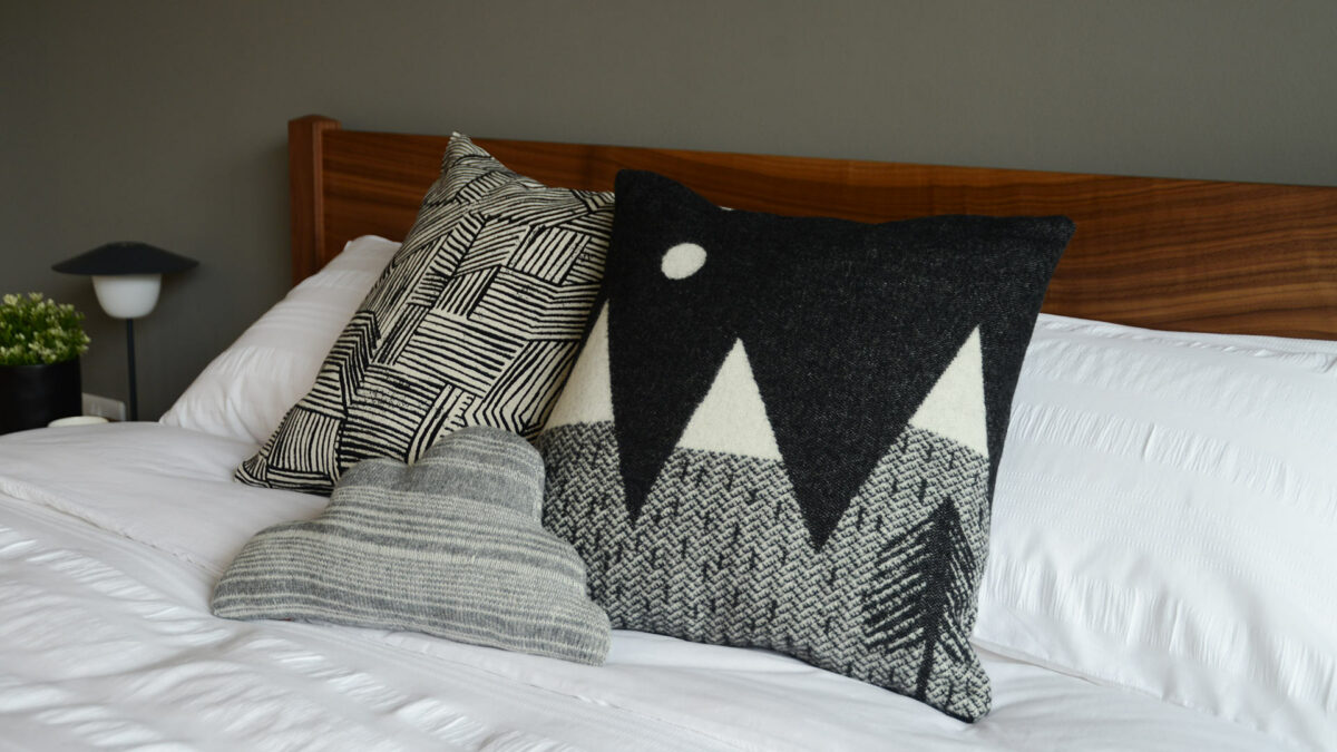 a group of donna wilson cushions