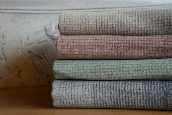 Alpaca and recycled wool gradient design throws in 4 colours