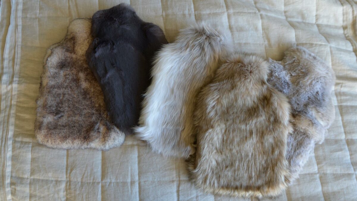 soft and cosy faux fur hot water bottles in a range of colours