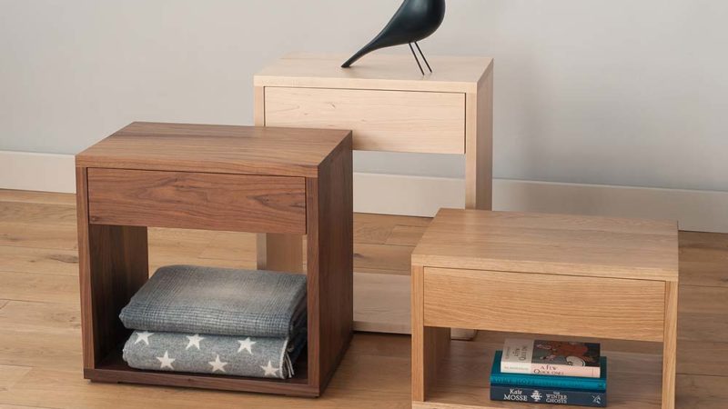 Bedside tables with a drawer and open shelf, available in a range of woods and in a choice of 3 heights.