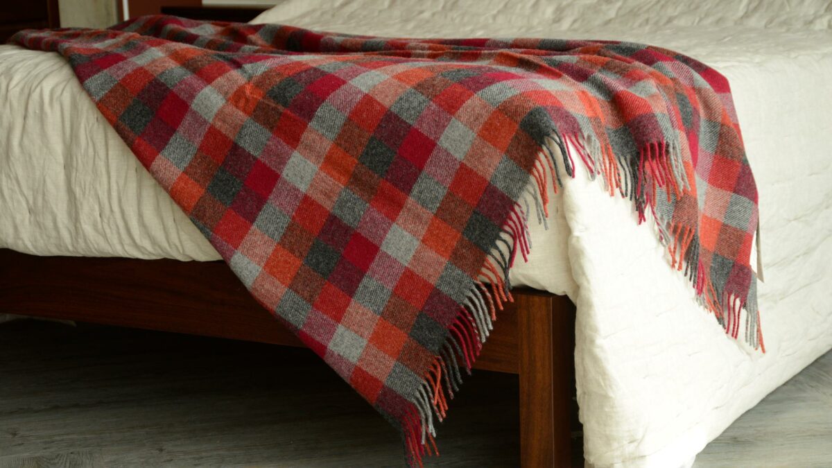 Fireside Red Check Wool Throw on Smoked Walnut Malabar