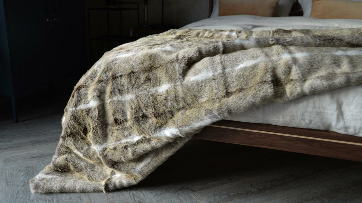 Softest faux fur throw in caramel colours and white