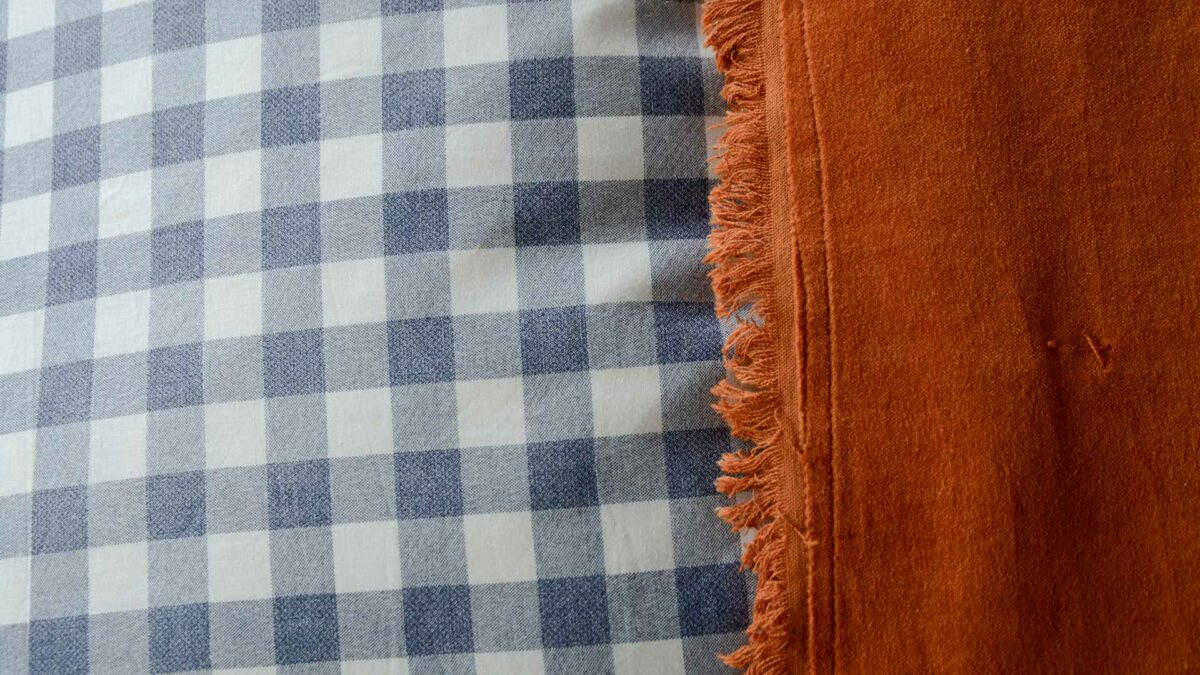 Gingham Bedding Navy Blue Closeup with Terracotta Velvet Quilt