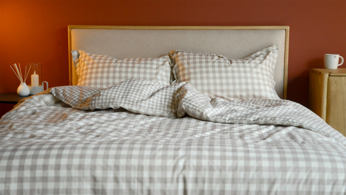 Gingham Bedding Soft Beige Rumpled on Oak Carlisle Bed