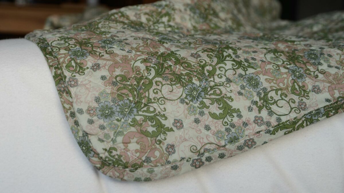 Green and Pink Print Quilted Throw Close Up