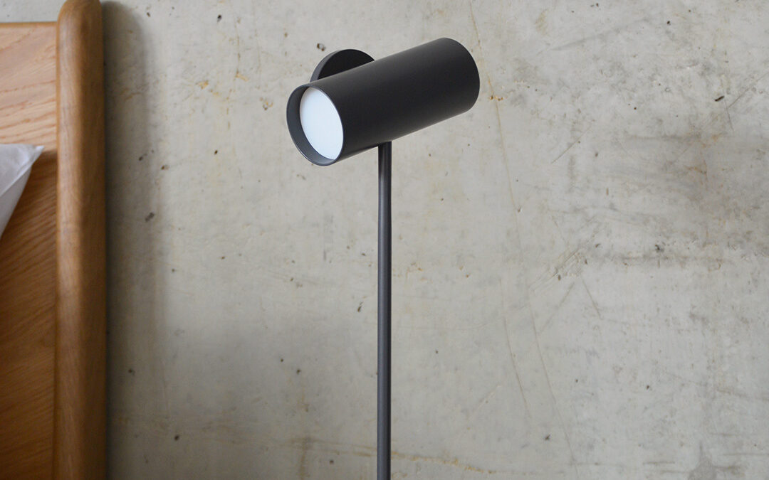 adjustable bedside spotlight in slate grey