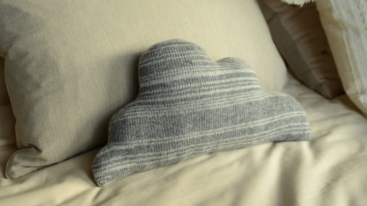 Donna Wilson small knitted cloud shaped cushion