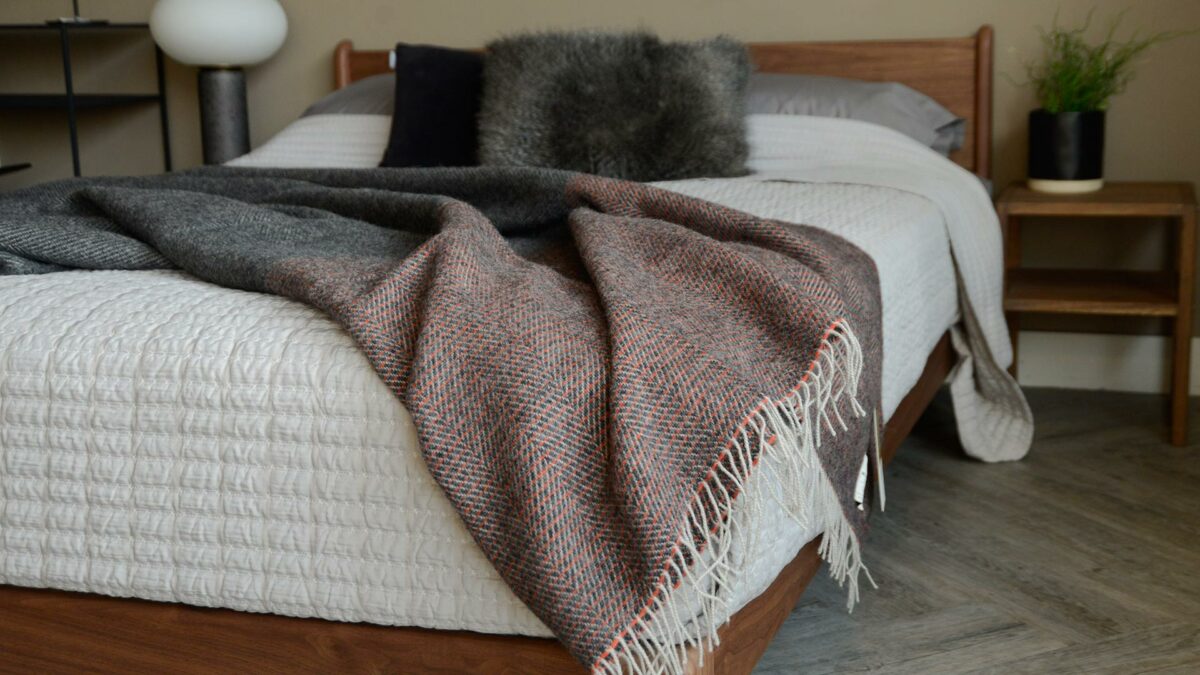 Grey and Orange Heavyweight Throw McNutt Tassels on Walnut Pimlico