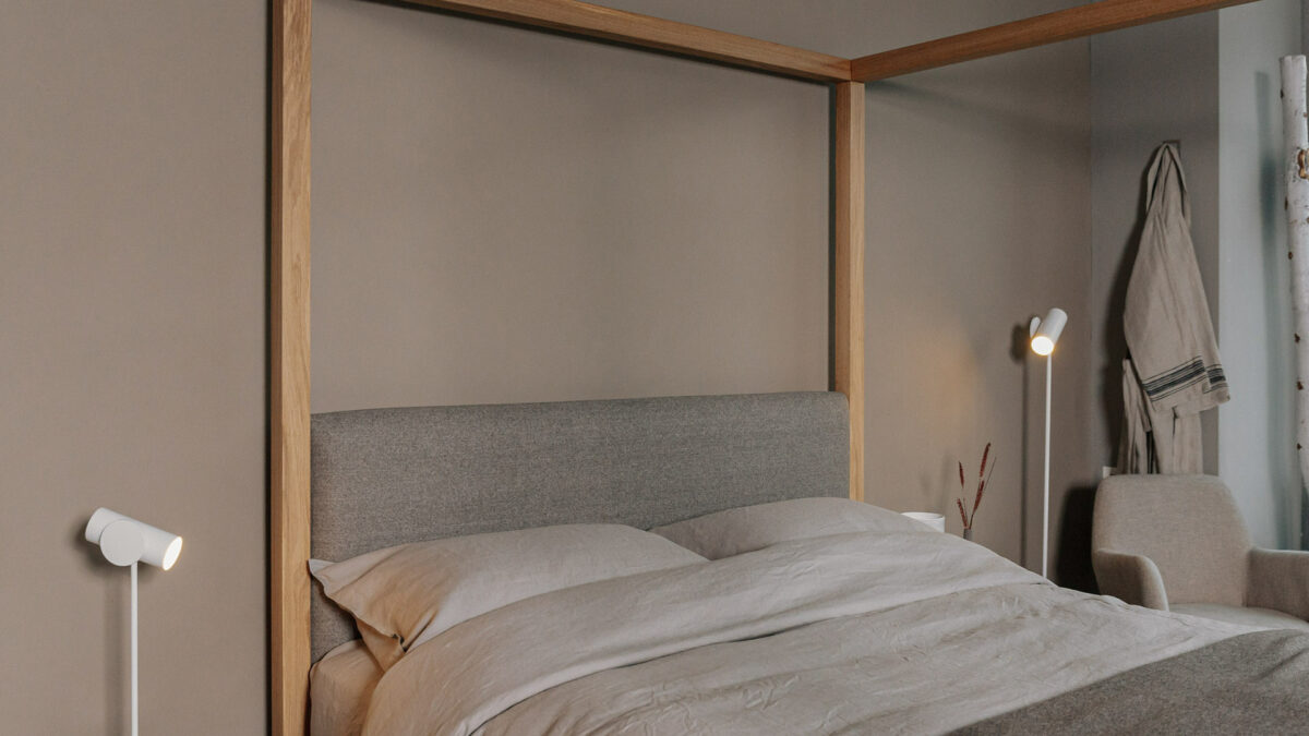 contemporary classic Highland 4 Poster bed in solid oak with a padded wool-upholstered headboard