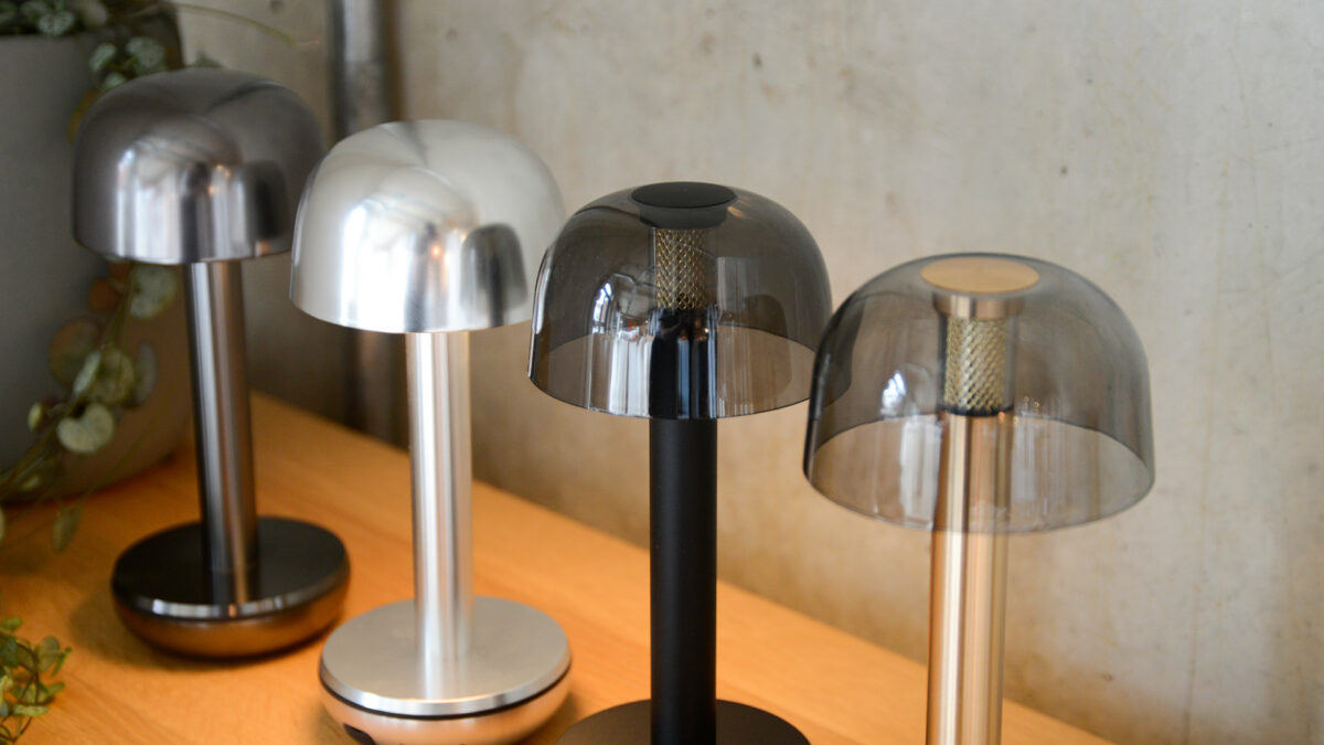 chargeable and portable modern lights in a range of metallic finishes with a solid or transparent shade