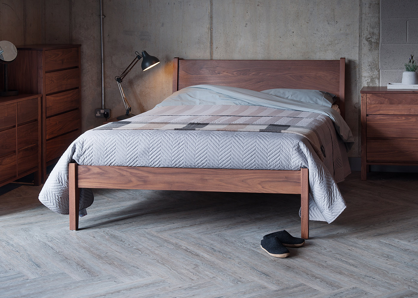 Industrial look bedroom featuring our Classic wooden Zanskar bed, here in Walnut