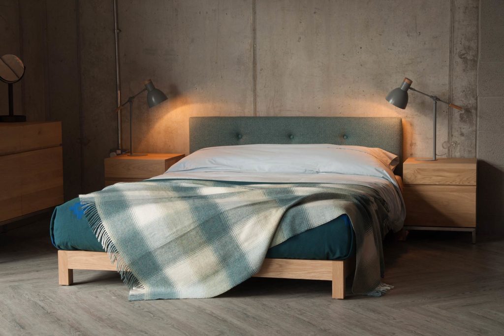 Made in uk our Iona low upholstered bed comes in a choice of timber and fabric, and in a full range of bed sizes.