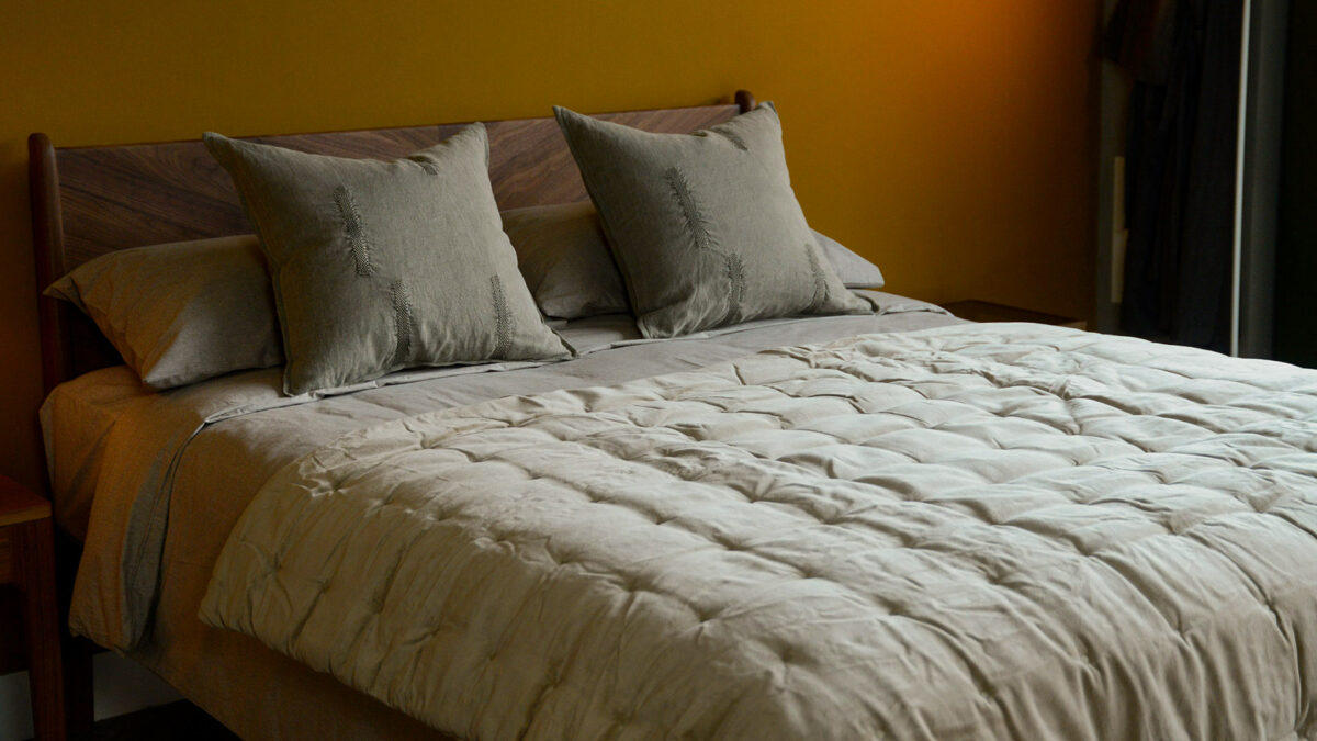 Jaipur Quilted Hazelnut Throw on Walnut Hoxton 1