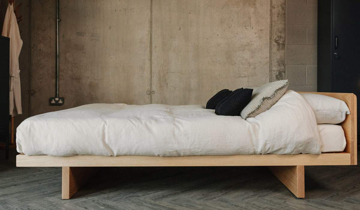 Kyoto low bed with headboard in solid ash side view 1920