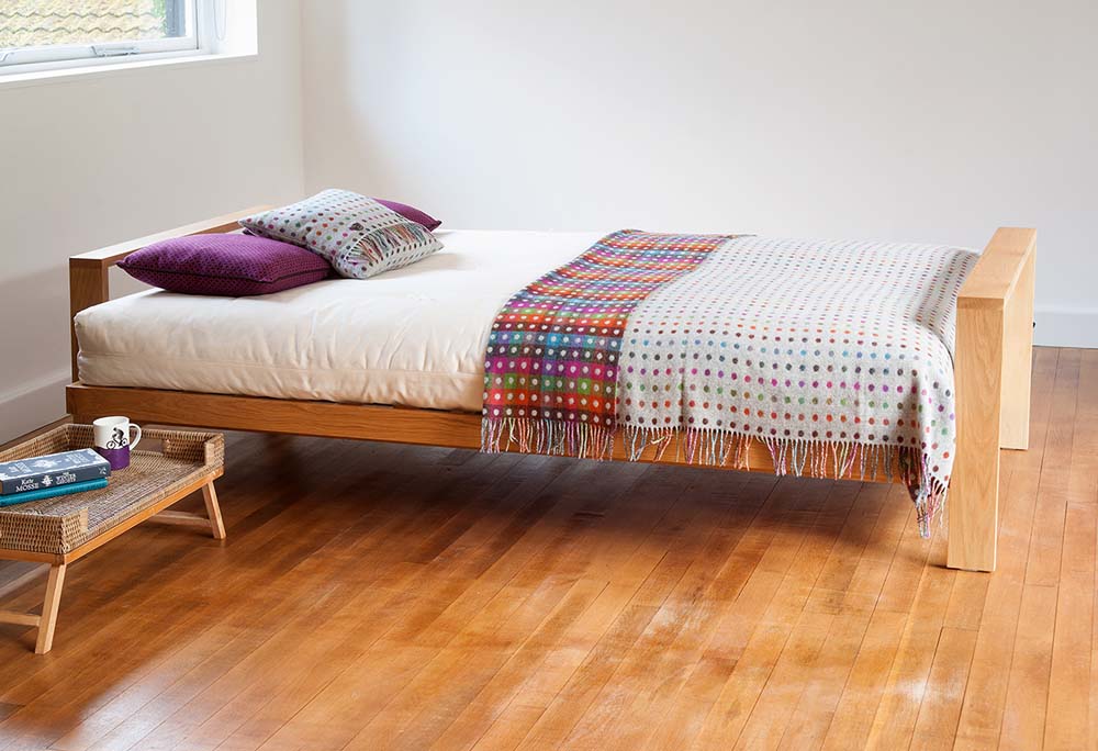 Our Oak Cuba Sofa bed folded out as a bed using the futon mattress supplied