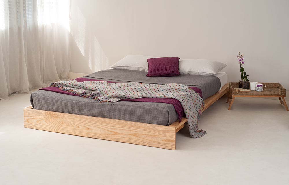 Great for a Small attic bedroom our low wooden bed the Ki platform bed is also good for futon mattresses