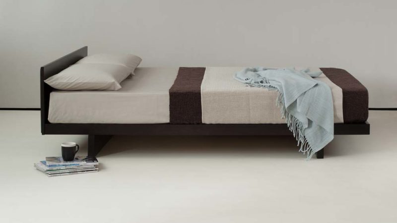 Japanese style Kumo bed - shown in wenge stained solid Pine - side view