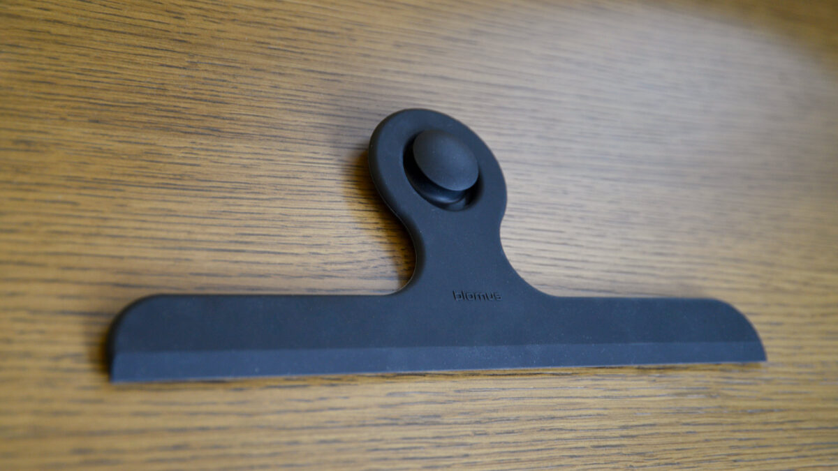 black shower wiper with hanger.