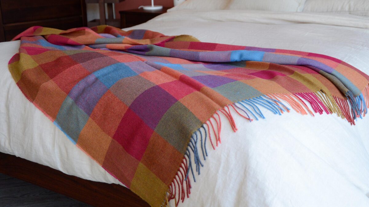 Merino Lambswool Check Throws DUSK Over Linen Bedding