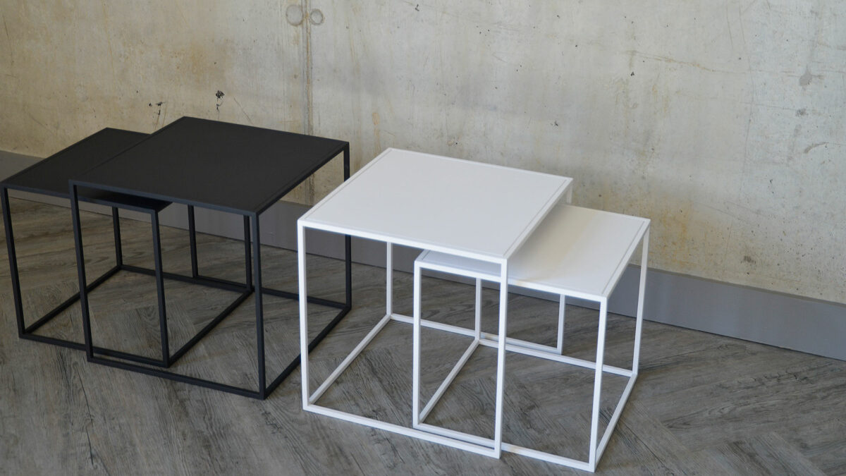 powder-coated steel nesting tables in white and slate grey